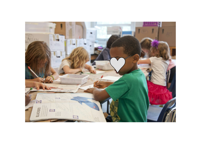 Children drawing and coloring in a classroom.